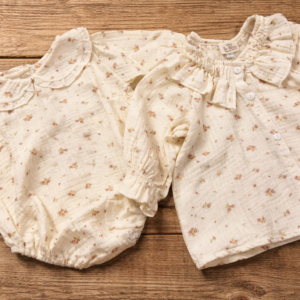 Body Muselina Flores en tonos Crema