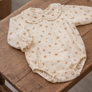 Body Muselina Flores en tonos Crema